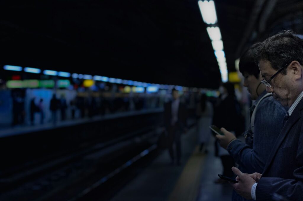 Businessman at a train station, representing localization strategies for branding and pricing