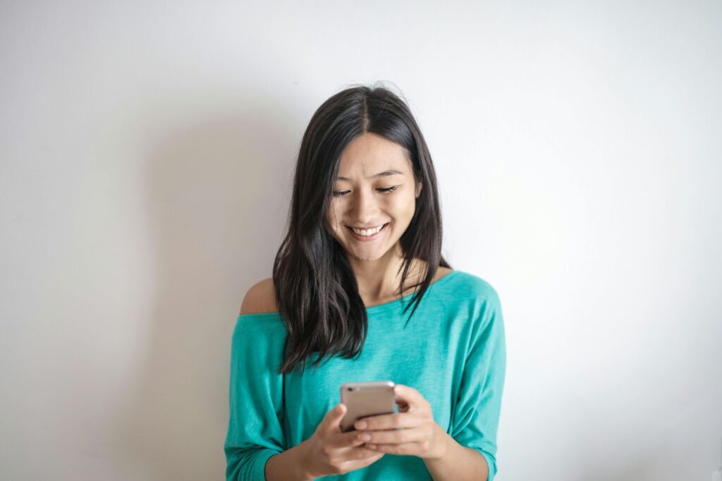 Woman using cellphone, reflecting digital innovation in China